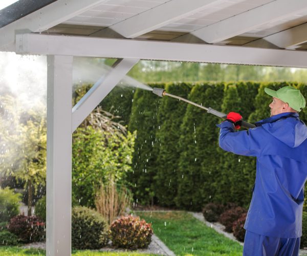 Men Pressure Washing Garden Porch Wooden Roof